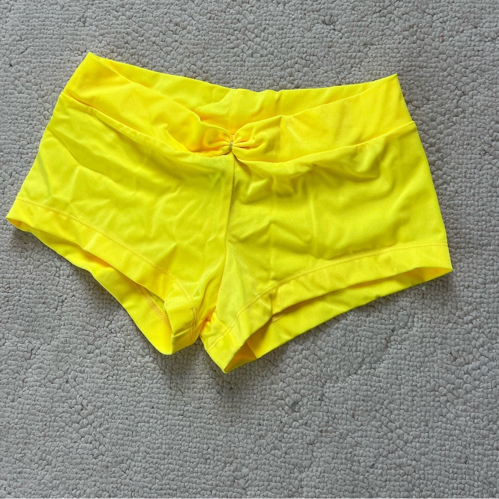 Never worn, neon yellow Dallaswear NFL/ NBA Dance Shorts